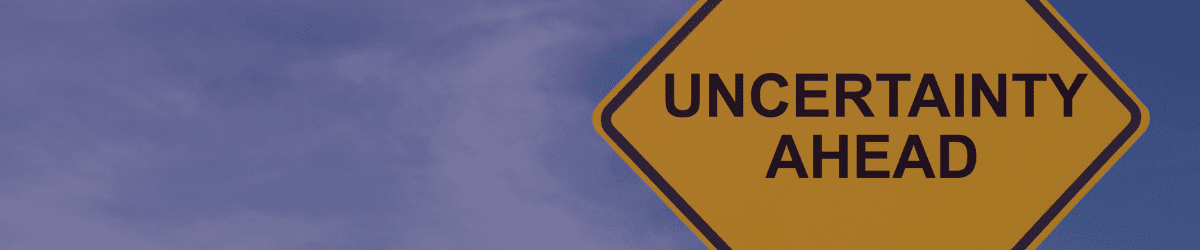 yellow-road-sign-reads-uncertainty-ahead